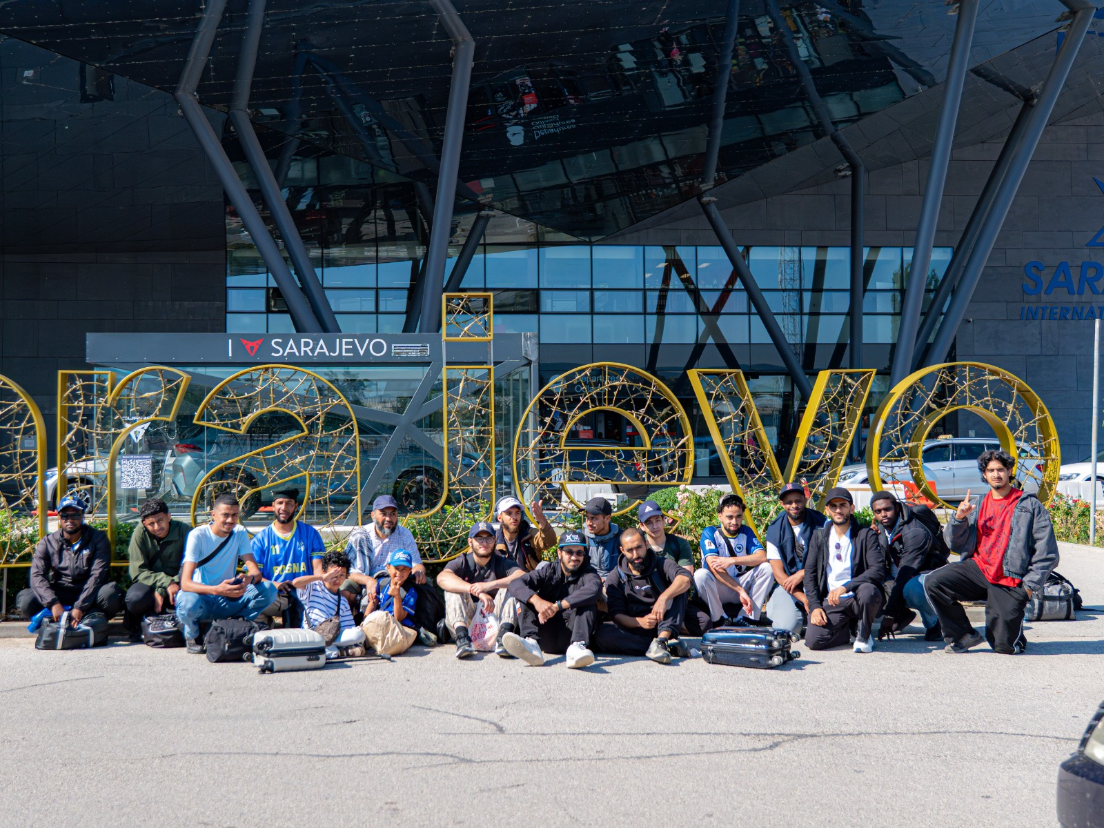 Arriving in Sarajevo — The group together at Sarajevo International Airport — ready for Bosnia.