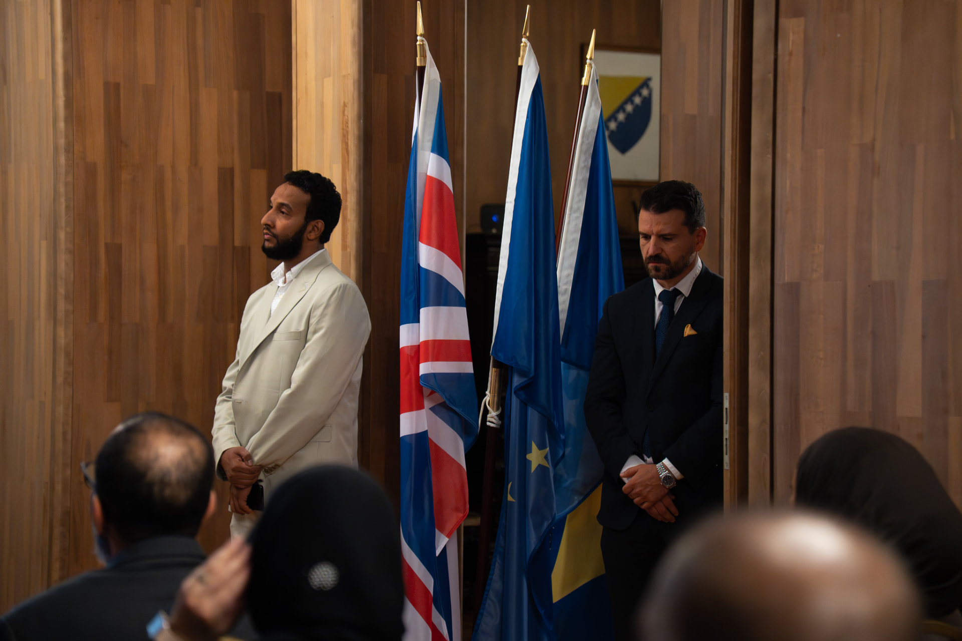 Just Tour representatives beside the UK, European and Bosnia and Herzegovina flags